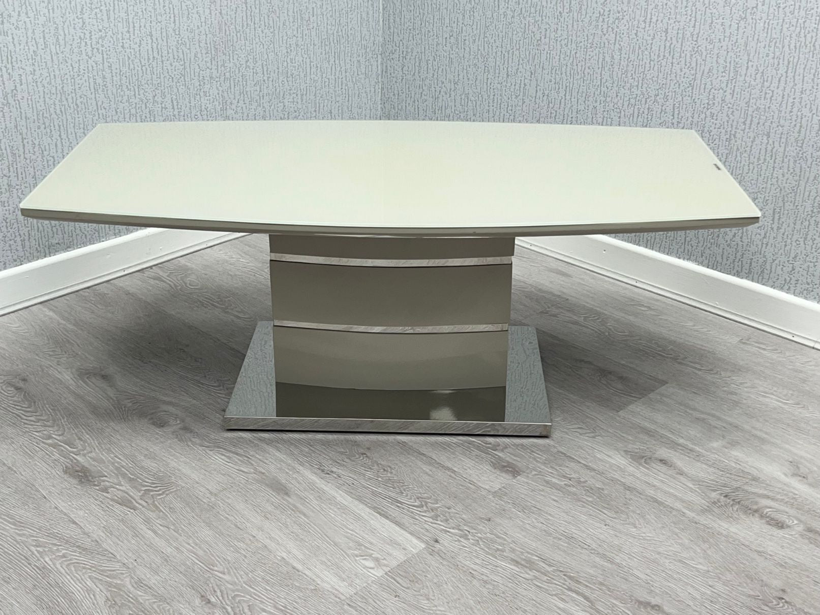 Milan Cappuccino High Gloss Coffee Table with chrome-trimmed layered pedestal base - front view
