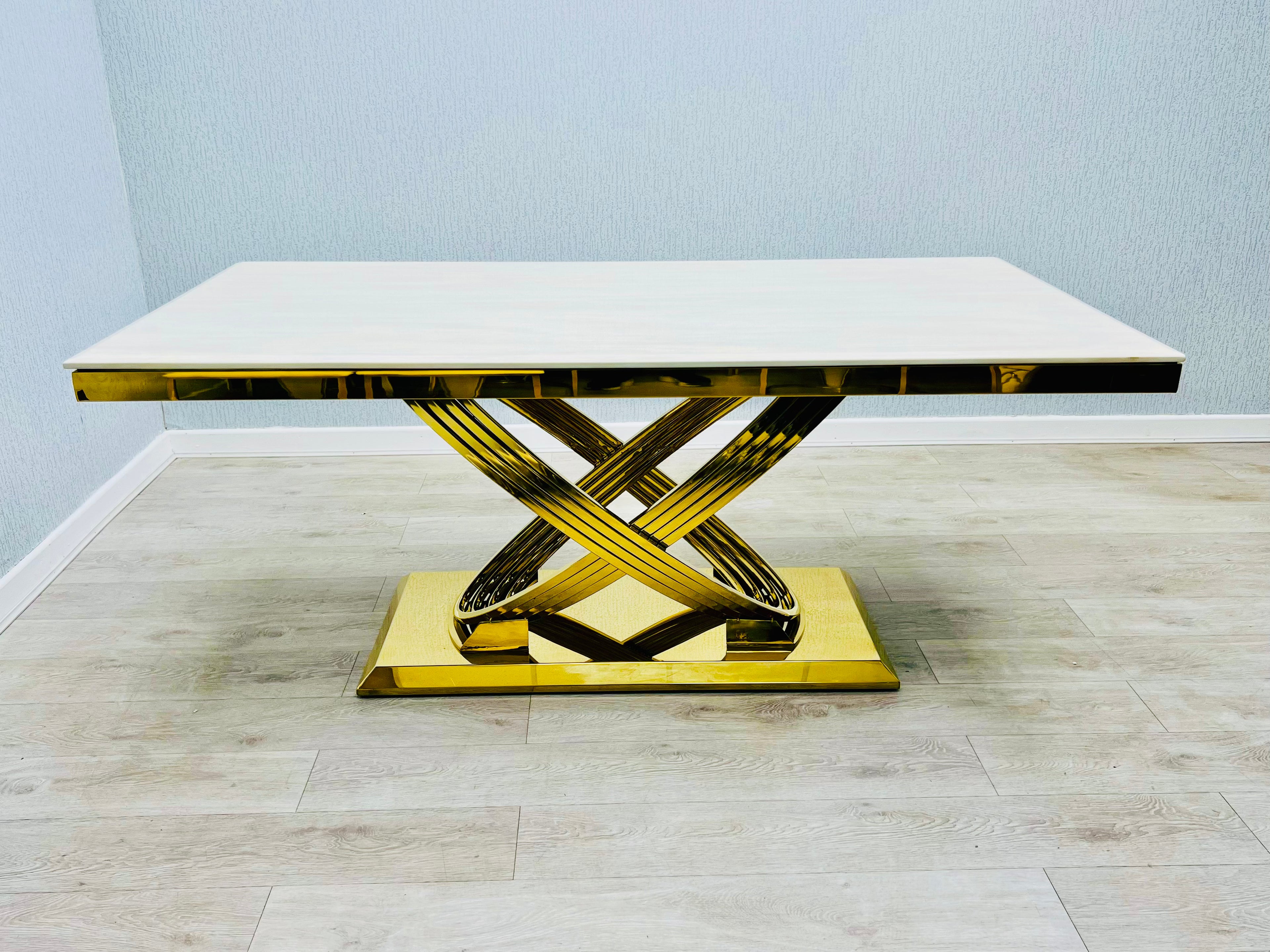 Elina Cream Ceramic Marble-Effect Coffee Table with gold X-twist pedestal base - front view
