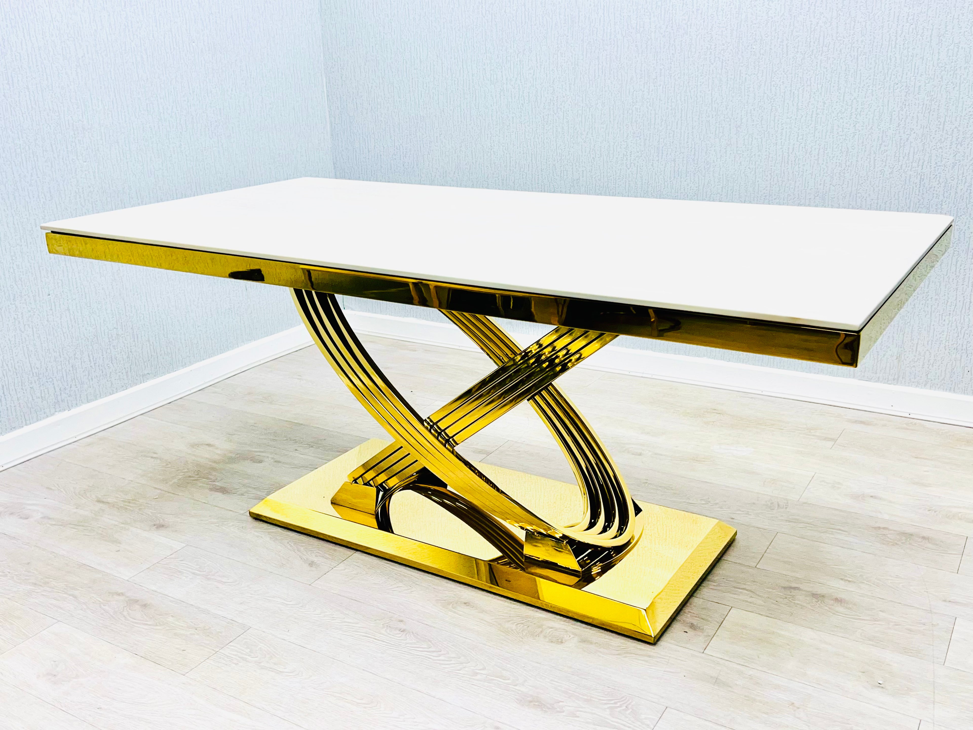 Elina Cream Ceramic Marble-Effect Coffee Table with gold X-twist pedestal base - angled view