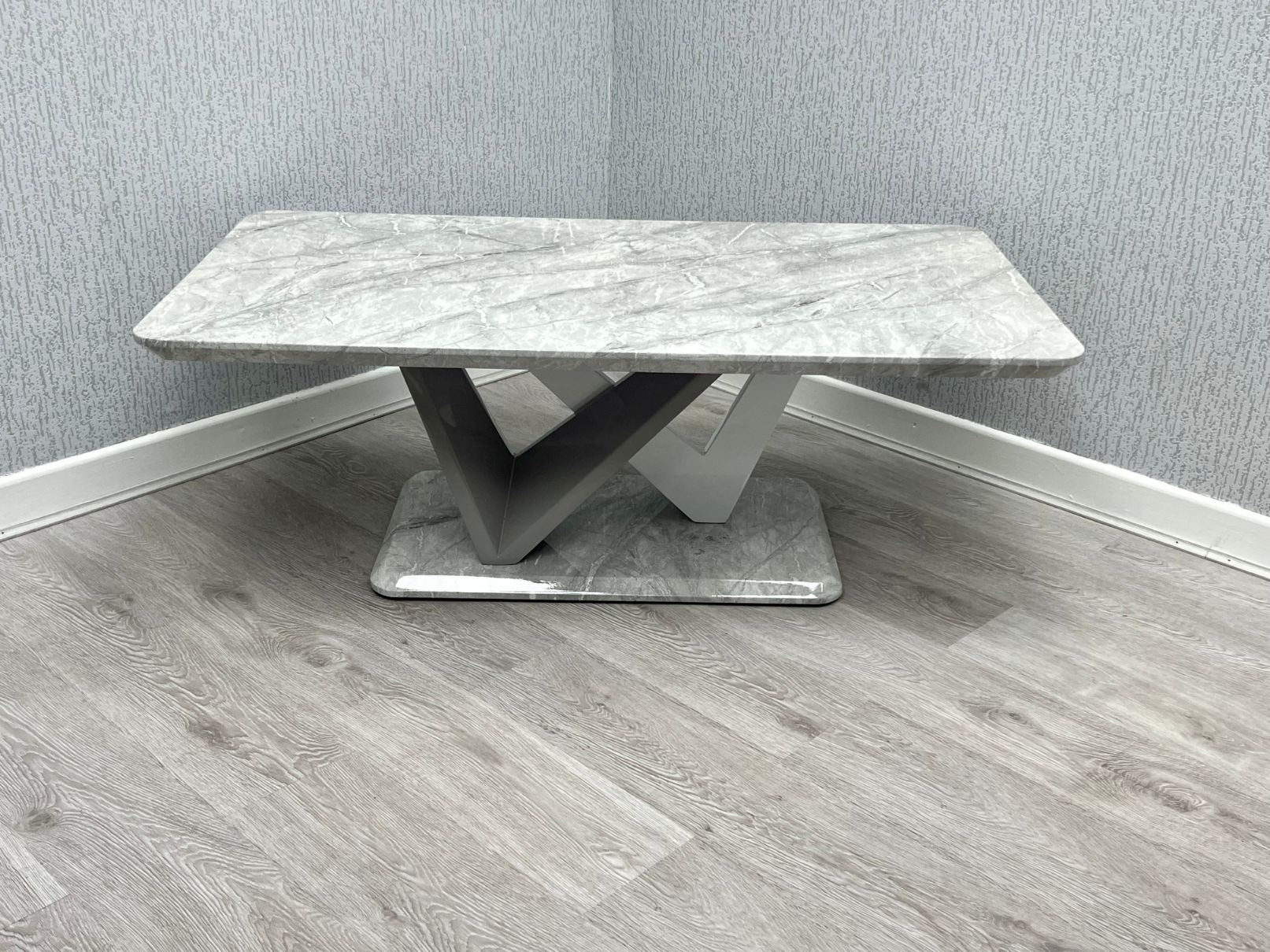 Georgia Grey Marble-Effect Coffee Table with matching X-twist pedestal base - angled view
